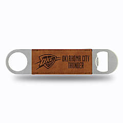 https://s7.orientaltrading.com/is/image/OrientalTrading/SEARCH_BROWSE/rico-industries-nba-basketball-oklahoma-city-thunder-brown-faux-leather-laser-engraved-bar-blade-great-beverage-accessory-for-game-day~14393777$NOWA$