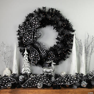 https://s7.orientaltrading.com/is/image/OrientalTrading/VIEWER_IMAGE_400/northlight-36-battery-operated-black-bristle-artificial-christmas-wreath-warm-white-led-lights~14306994